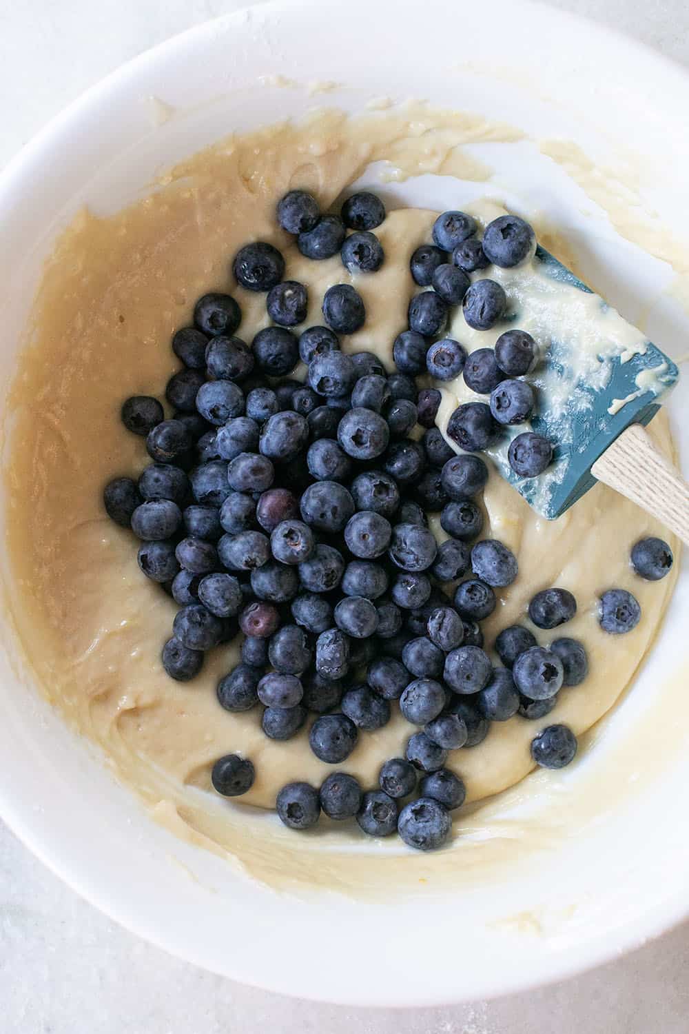 muffin batter with fresh blueberries